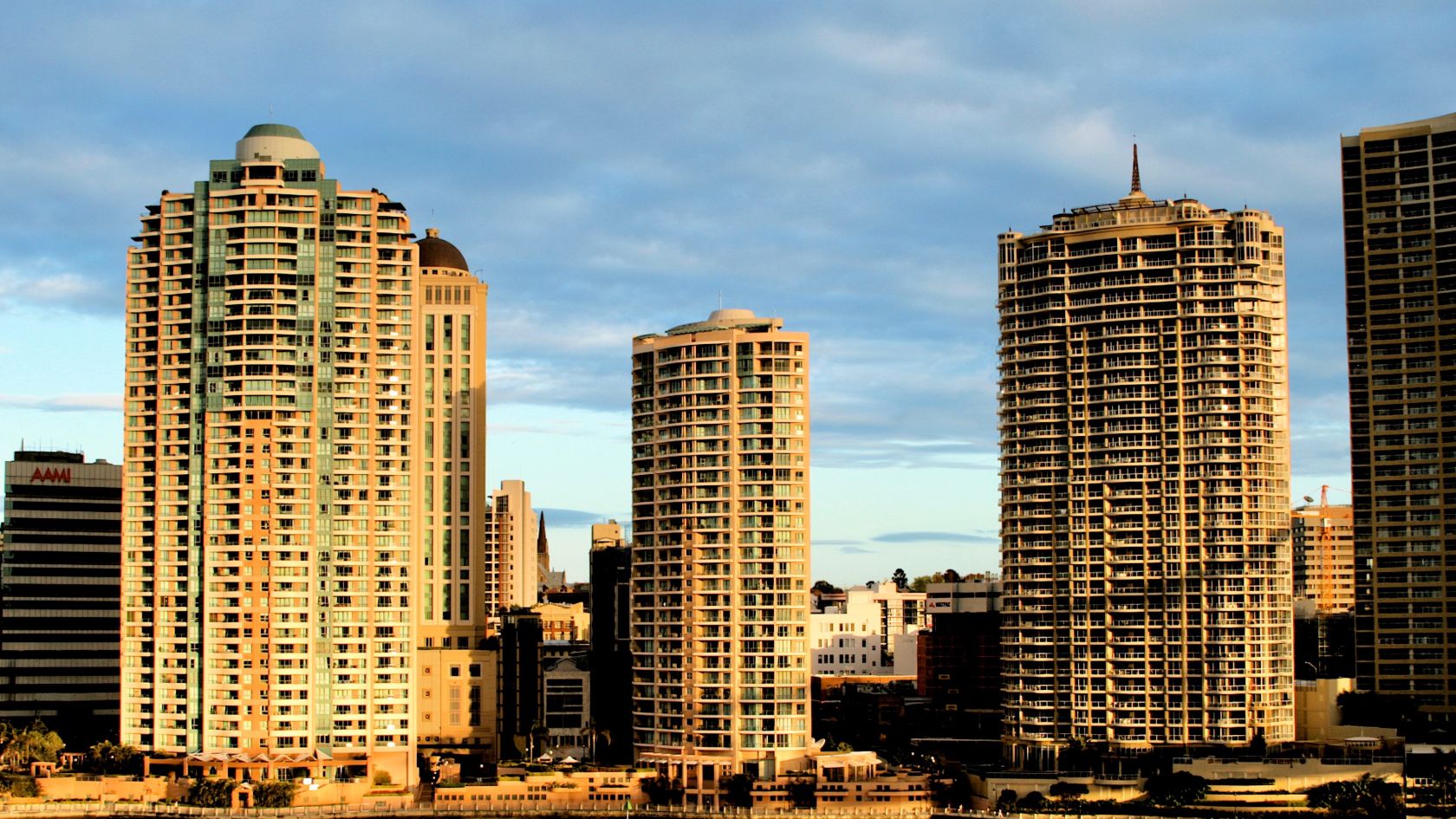 Admiralty Towers I and Brisbane City towers at golden hour